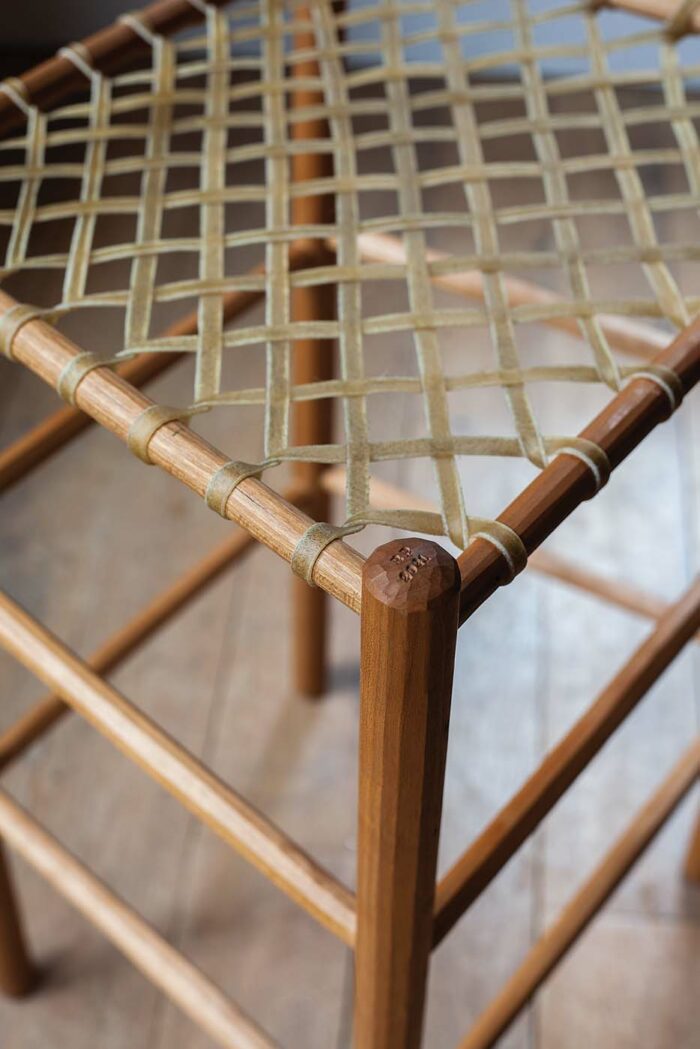 rawhide and wood dowel chair by Brian Persico