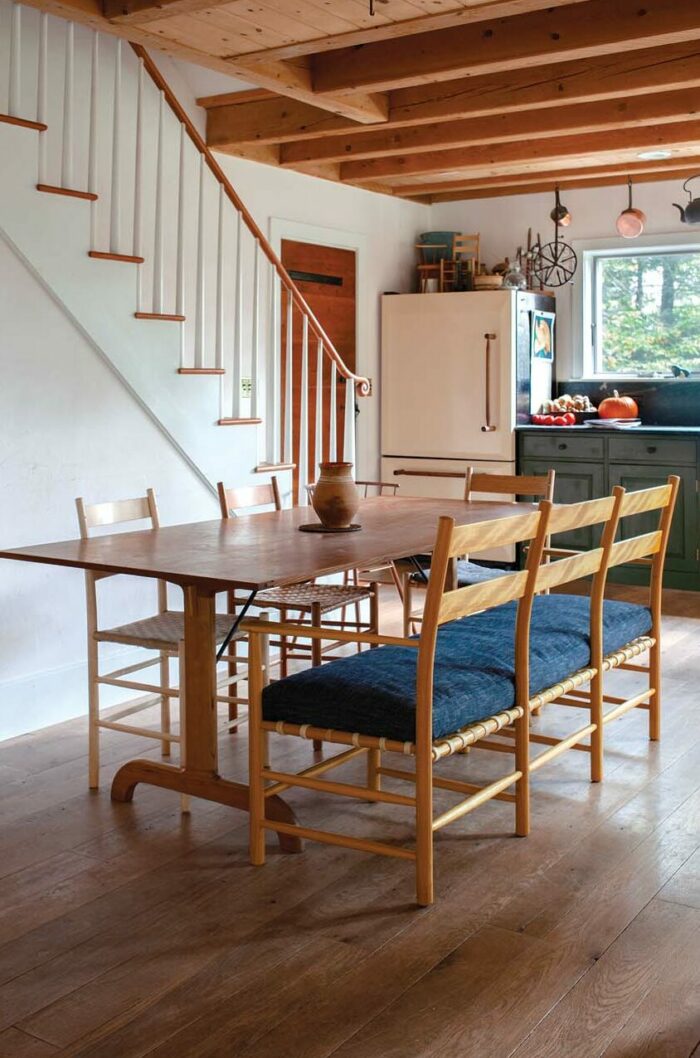 wood dinning table set by Brian Persico