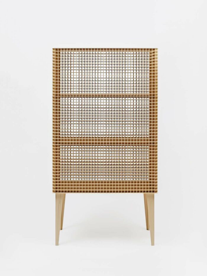 checkered panel wood cabinet with negative space by Gunther Pfeffer