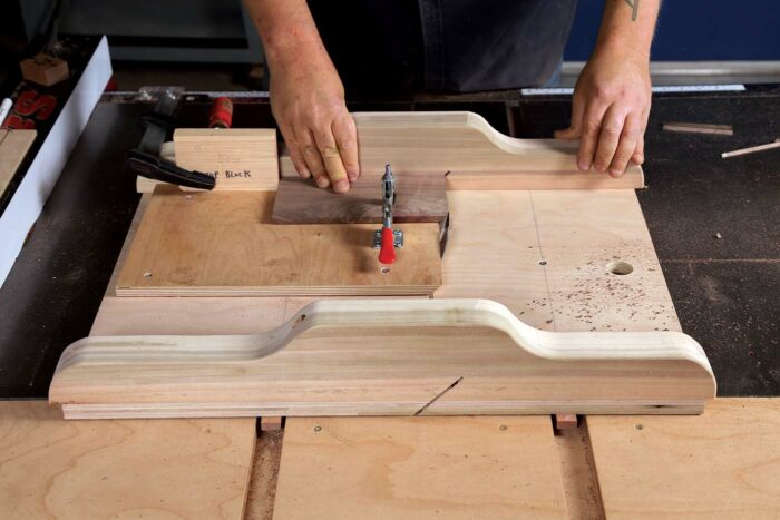 Cutting miters on a table saw sled