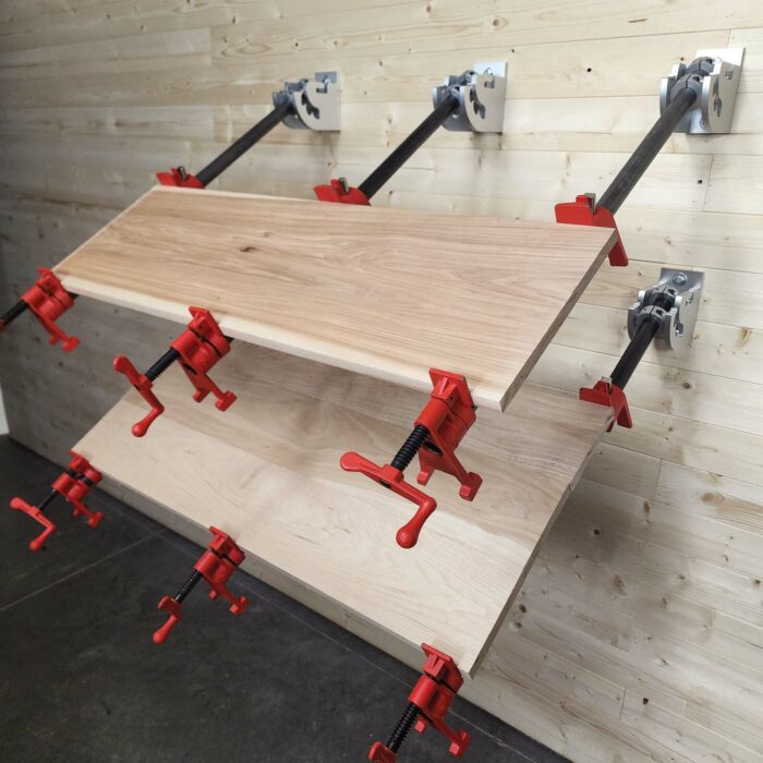 Timber River Tool Company’s Clamp Companion being used on wall