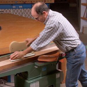 grab the push stick while moving along the jointer